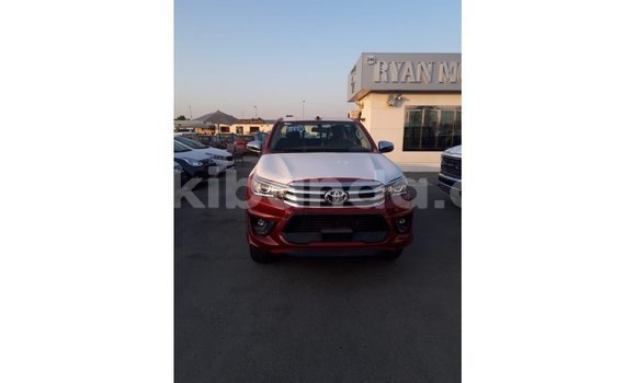 Buy Import Toyota Hilux Red Car in Import - Dubai in Uganda Buy Import Toyota Hilux Red Car in Import - Dubai in Uganda