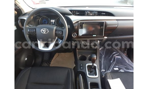 Buy Import Toyota Hilux Red Car in Import - Dubai in Uganda Buy Import Toyota Hilux Red Car in Import - Dubai in Uganda