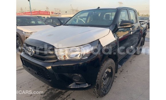 Nunua Imported Toyota Hilux Nyeusi Gari ndani ya Import - Dubai nchini Uganda Nunua Imported Toyota Hilux Nyeusi Gari ndani ya Import - Dubai nchini Uganda