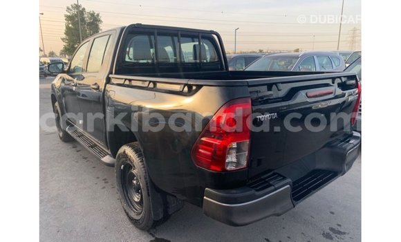 Nunua Imported Toyota Hilux Nyeusi Gari ndani ya Import - Dubai nchini Uganda Nunua Imported Toyota Hilux Nyeusi Gari ndani ya Import - Dubai nchini Uganda