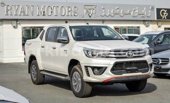 Gura Imported Toyota Hilux White Imodoka i Import - Dubai mu Uganda Gura Imported Toyota Hilux White Imodoka i Import - Dubai mu Uganda