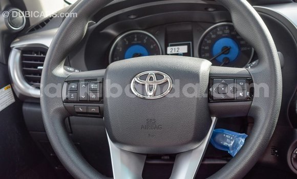 Gura Imported Toyota Hilux White Imodoka i Import - Dubai mu Uganda Gura Imported Toyota Hilux White Imodoka i Import - Dubai mu Uganda