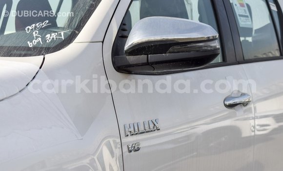Gura Imported Toyota Hilux White Imodoka i Import - Dubai mu Uganda Gura Imported Toyota Hilux White Imodoka i Import - Dubai mu Uganda