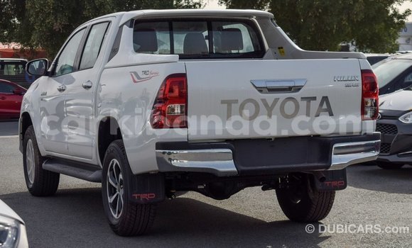 Gura Imported Toyota Hilux White Imodoka i Import - Dubai mu Uganda Gura Imported Toyota Hilux White Imodoka i Import - Dubai mu Uganda
