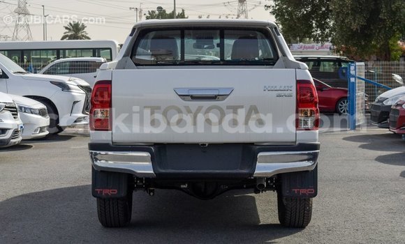 Gura Imported Toyota Hilux White Imodoka i Import - Dubai mu Uganda Gura Imported Toyota Hilux White Imodoka i Import - Dubai mu Uganda