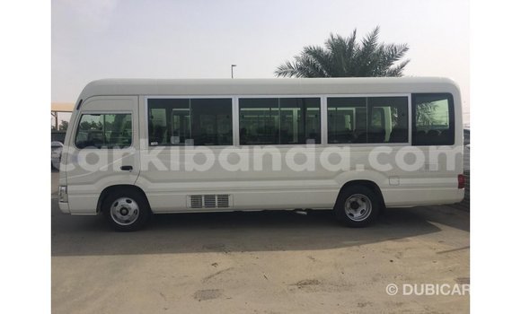 Buy Import Toyota Coaster White Car in Import - Dubai in Uganda Buy Import Toyota Coaster White Car in Import - Dubai in Uganda
