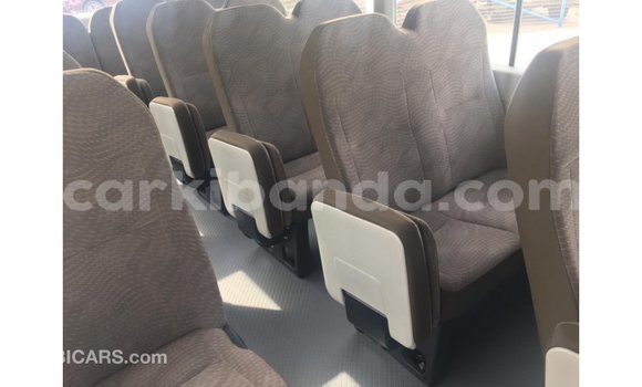 Buy Import Toyota Coaster White Car in Import - Dubai in Uganda Buy Import Toyota Coaster White Car in Import - Dubai in Uganda