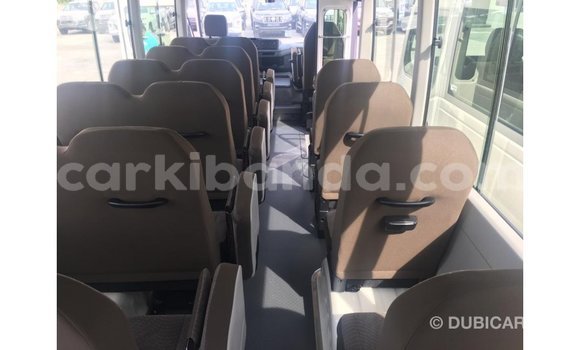 Buy Import Toyota Coaster White Car in Import - Dubai in Uganda Buy Import Toyota Coaster White Car in Import - Dubai in Uganda