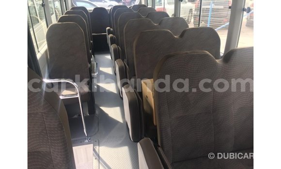 Buy Import Toyota Coaster White Car in Import - Dubai in Uganda Buy Import Toyota Coaster White Car in Import - Dubai in Uganda