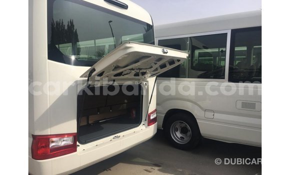 Buy Import Toyota Coaster White Car in Import - Dubai in Uganda Buy Import Toyota Coaster White Car in Import - Dubai in Uganda