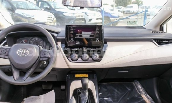 Buy Import Toyota Corolla White Car in Import - Dubai in Uganda Buy Import Toyota Corolla White Car in Import - Dubai in Uganda