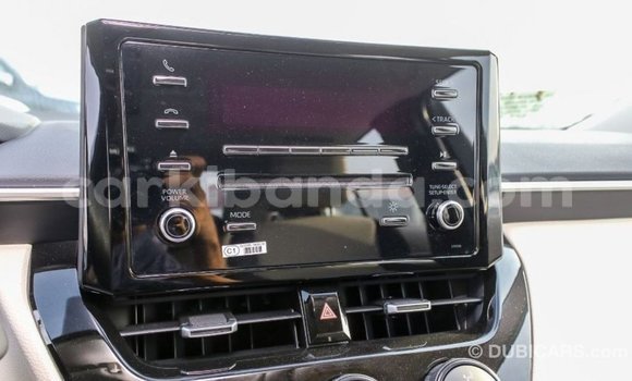 Buy Import Toyota Corolla White Car in Import - Dubai in Uganda Buy Import Toyota Corolla White Car in Import - Dubai in Uganda