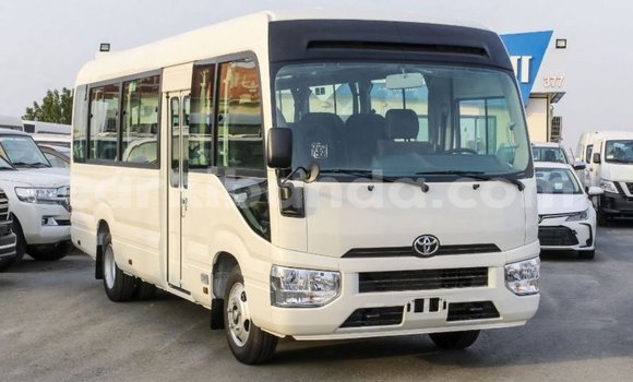 Acheter Import Voiture Toyota Coaster Blanc à Import - Dubai, Ouganda Acheter Import Voiture Toyota Coaster Blanc à Import - Dubai, Ouganda