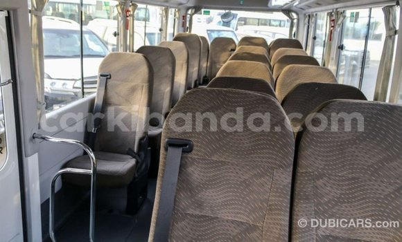 Buy Import Toyota Coaster White Car in Import - Dubai in Uganda Buy Import Toyota Coaster White Car in Import - Dubai in Uganda
