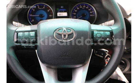 Buy Import Toyota Hilux White Car in Import - Dubai in Uganda Buy Import Toyota Hilux White Car in Import - Dubai in Uganda