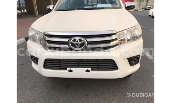 Buy Import Toyota Hilux White Car in Import - Dubai in Uganda Buy Import Toyota Hilux White Car in Import - Dubai in Uganda