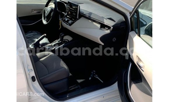 Gura Imported Toyota Corolla White Imodoka i Import - Dubai mu Uganda Gura Imported Toyota Corolla White Imodoka i Import - Dubai mu Uganda