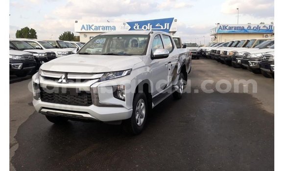 Buy Import Mitsubishi L200 White Car in Import - Dubai in Uganda Buy Import Mitsubishi L200 White Car in Import - Dubai in Uganda