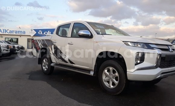 Buy Import Mitsubishi L200 White Car in Import - Dubai in Uganda Buy Import Mitsubishi L200 White Car in Import - Dubai in Uganda
