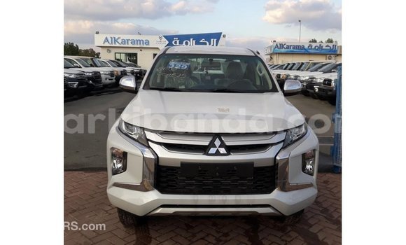 Buy Import Mitsubishi L200 White Car in Import - Dubai in Uganda Buy Import Mitsubishi L200 White Car in Import - Dubai in Uganda