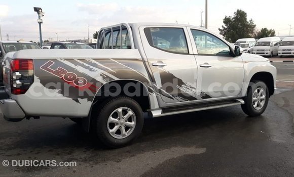 Buy Import Mitsubishi L200 White Car in Import - Dubai in Uganda Buy Import Mitsubishi L200 White Car in Import - Dubai in Uganda