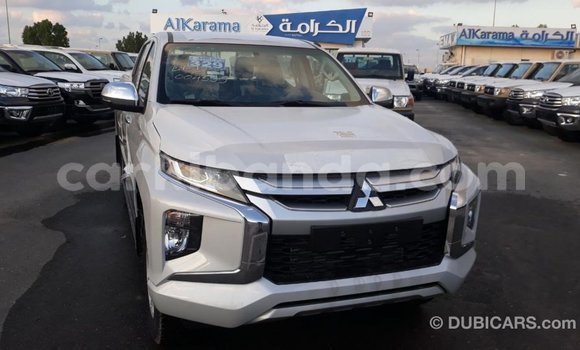 Buy Import Mitsubishi L200 White Car in Import - Dubai in Uganda Buy Import Mitsubishi L200 White Car in Import - Dubai in Uganda