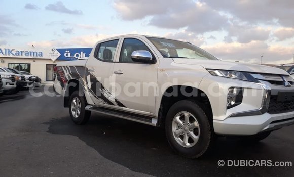 Buy Import Mitsubishi L200 White Car in Import - Dubai in Uganda Buy Import Mitsubishi L200 White Car in Import - Dubai in Uganda