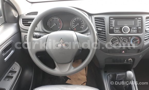 Buy Import Mitsubishi L200 White Car in Import - Dubai in Uganda Buy Import Mitsubishi L200 White Car in Import - Dubai in Uganda