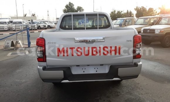 Buy Import Mitsubishi L200 White Car in Import - Dubai in Uganda Buy Import Mitsubishi L200 White Car in Import - Dubai in Uganda