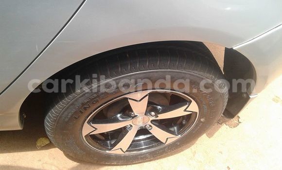 Gura Yakoze Toyota Allex Silver Imodoka i Kampala mu Uganda Gura Yakoze Toyota Allex Silver Imodoka i Kampala mu Uganda