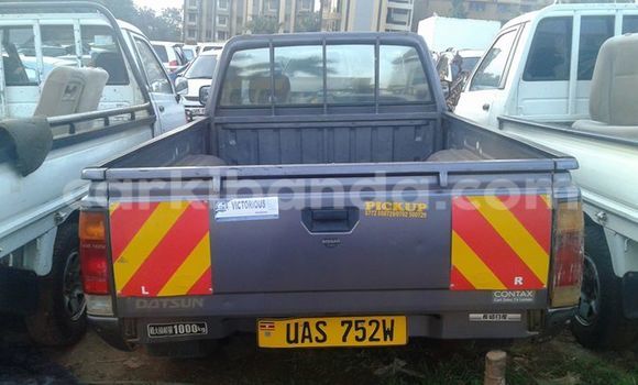 Gura Yakoze Nissan Pickup Black Imodoka i Kampala mu Uganda Gura Yakoze Nissan Pickup Black Imodoka i Kampala mu Uganda