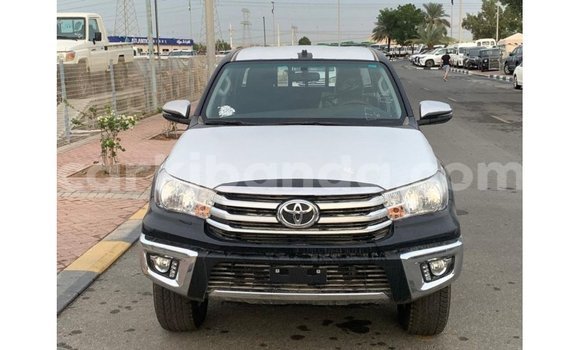 Gura Imported Toyota Hilux Black Imodoka i Import - Dubai mu Uganda Gura Imported Toyota Hilux Black Imodoka i Import - Dubai mu Uganda