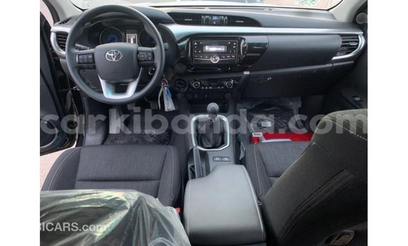Gura Imported Toyota Hilux Black Imodoka i Import - Dubai mu Uganda Gura Imported Toyota Hilux Black Imodoka i Import - Dubai mu Uganda