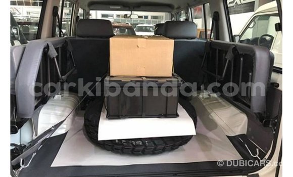 Gura Imported Toyota Land Cruiser White Imodoka i Import - Dubai mu Uganda Gura Imported Toyota Land Cruiser White Imodoka i Import - Dubai mu Uganda
