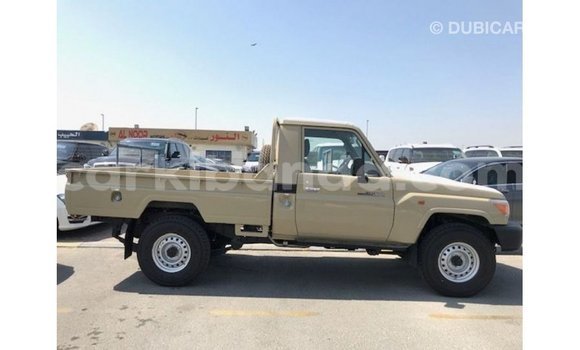 Gura Imported Toyota Land Cruiser Beige Imodoka i Import - Dubai mu Uganda Gura Imported Toyota Land Cruiser Beige Imodoka i Import - Dubai mu Uganda