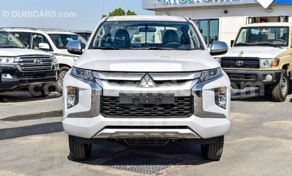Buy Import Mitsubishi L200 White Car in Import - Dubai in Uganda Buy Import Mitsubishi L200 White Car in Import - Dubai in Uganda