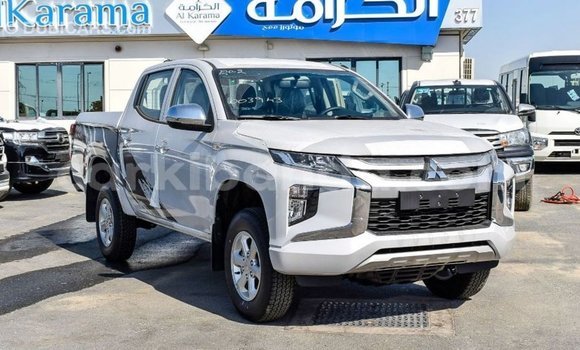 Buy Import Mitsubishi L200 White Car in Import - Dubai in Uganda Buy Import Mitsubishi L200 White Car in Import - Dubai in Uganda