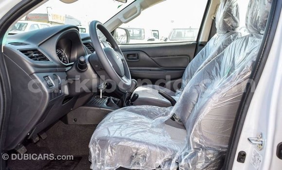 Buy Import Mitsubishi L200 White Car in Import - Dubai in Uganda Buy Import Mitsubishi L200 White Car in Import - Dubai in Uganda