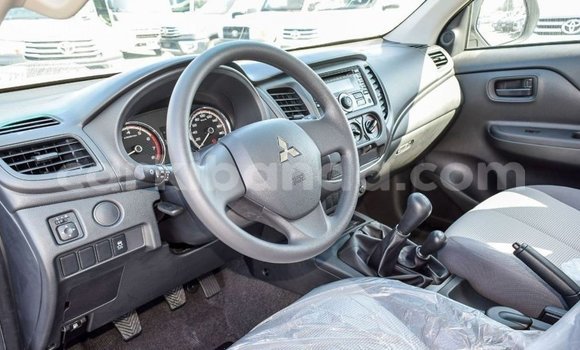 Buy Import Mitsubishi L200 White Car in Import - Dubai in Uganda Buy Import Mitsubishi L200 White Car in Import - Dubai in Uganda