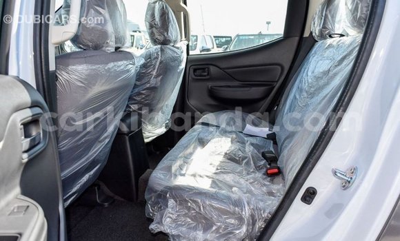 Buy Import Mitsubishi L200 White Car in Import - Dubai in Uganda Buy Import Mitsubishi L200 White Car in Import - Dubai in Uganda