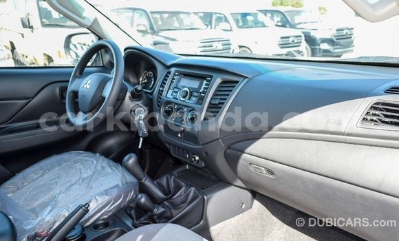 Buy Import Mitsubishi L200 White Car in Import - Dubai in Uganda Buy Import Mitsubishi L200 White Car in Import - Dubai in Uganda