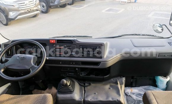 Buy Import Toyota Coaster White Car in Import - Dubai in Uganda Buy Import Toyota Coaster White Car in Import - Dubai in Uganda