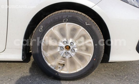 Buy Import Toyota Corolla White Car in Import - Dubai in Uganda Buy Import Toyota Corolla White Car in Import - Dubai in Uganda