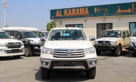 Buy Import Toyota Hilux White Car in Import - Dubai in Uganda Buy Import Toyota Hilux White Car in Import - Dubai in Uganda