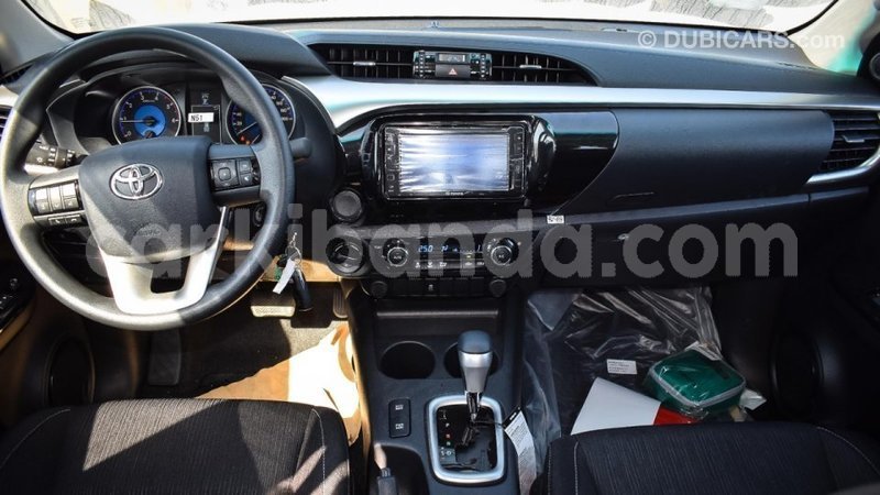 Big with watermark toyota hilux uganda import dubai 9254