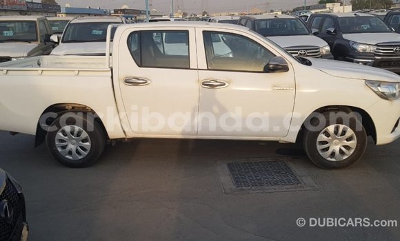 Buy Import Toyota Hilux White Car in Import - Dubai in Uganda Buy Import Toyota Hilux White Car in Import - Dubai in Uganda
