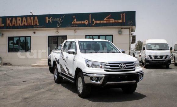 Buy Import Toyota Hilux White Car in Import - Dubai in Uganda Buy Import Toyota Hilux White Car in Import - Dubai in Uganda