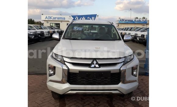 Buy Import Mitsubishi L200 White Car in Import - Dubai in Uganda Buy Import Mitsubishi L200 White Car in Import - Dubai in Uganda
