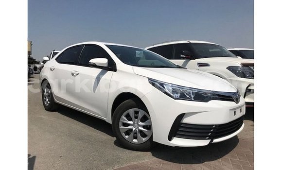 Buy Import Toyota Corolla White Car in Import - Dubai in Uganda Buy Import Toyota Corolla White Car in Import - Dubai in Uganda