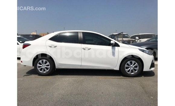 Buy Import Toyota Corolla White Car in Import - Dubai in Uganda Buy Import Toyota Corolla White Car in Import - Dubai in Uganda